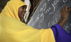 A student writes on the blackboard at Qansahley Primary School in Dollow town, Somalia.
